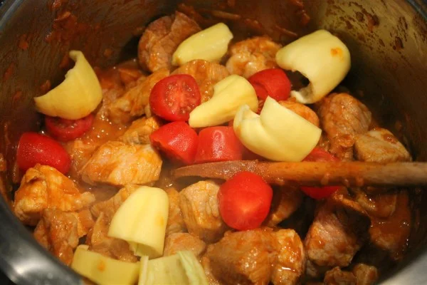 Add tomatoes and green peppers