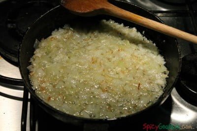 Simmer the onions until lightly golden