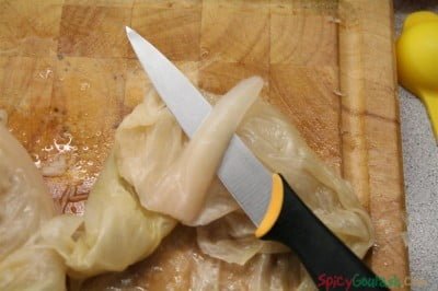 Cut out the strong part of the cabbage leaves