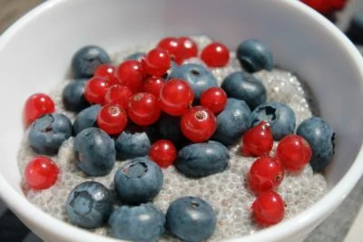 Chia pudding closeup with blackcurrants and blackberries